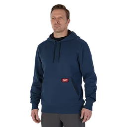 Man wearing the blue midweight pullover hoodie