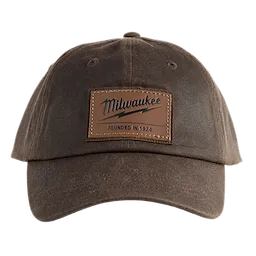 Waxed Canvas Adjustable Hat in brown with a leather patch displaying "Milwaukee Founded in 1924" on the front.