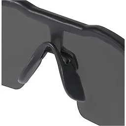 Close-up of Safety Glasses - Tinted Anti-Scratch Lenses focusing on the black nose pads and the edge of the tinted lenses.