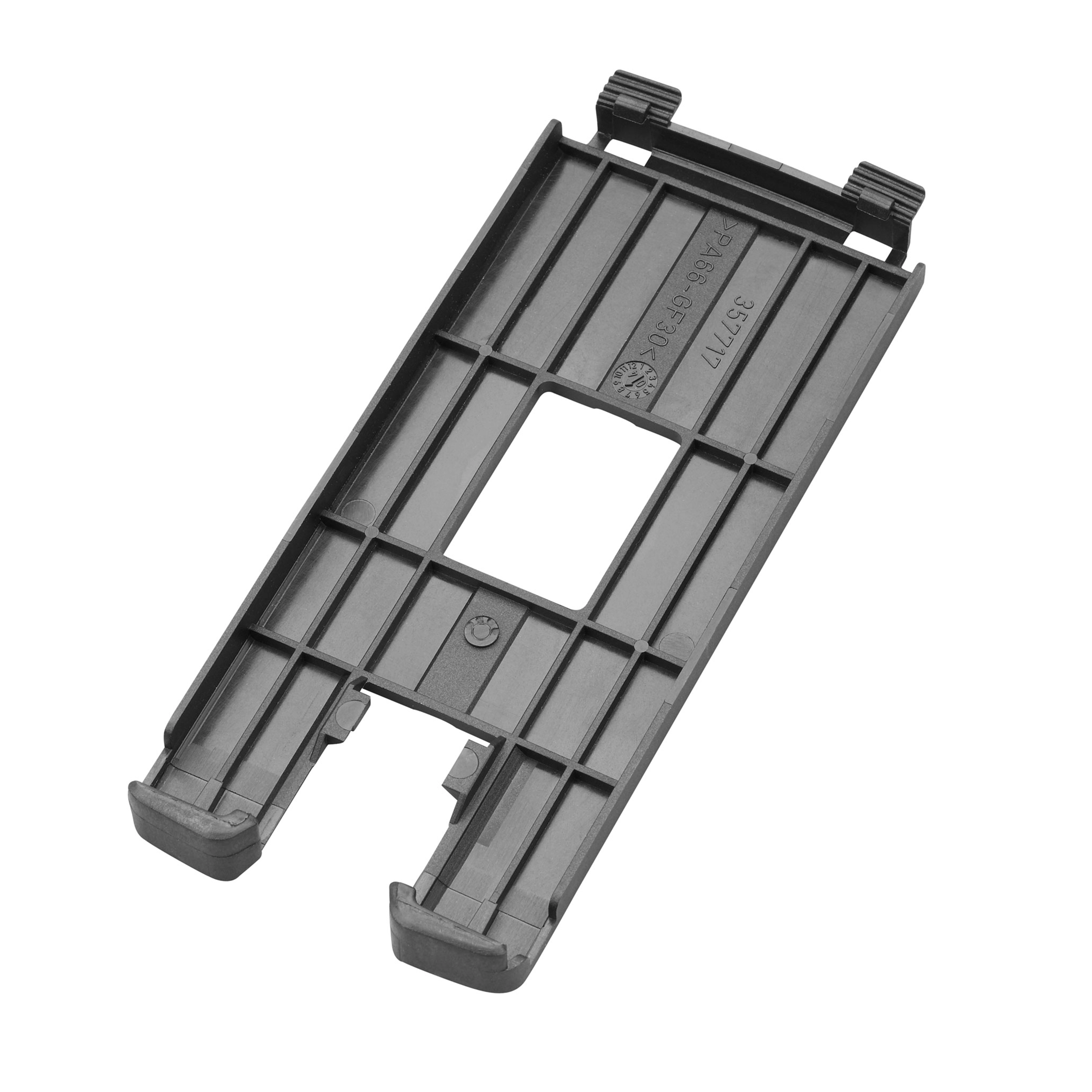 Jig Saw Plastic Shoe Cover is a rectangular black plastic accessory with grooved sides, designed to protect surfaces during cutting. It has a central cutout and hook attachments on one end for securing to the jig saw.