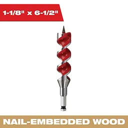 The 1-1/8 x 6-1/2 IN Auger Bit is designed for drilling into nail-embedded wood. This bit features a spiral design with a red finish and a threaded tip to ensure precise and effective drilling.