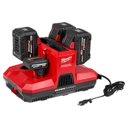 M18 & M12 Four Bay Simultaneous Super Charger with PACKOUT Compatibility in red, charging four batteries, with a plug-in power cord.