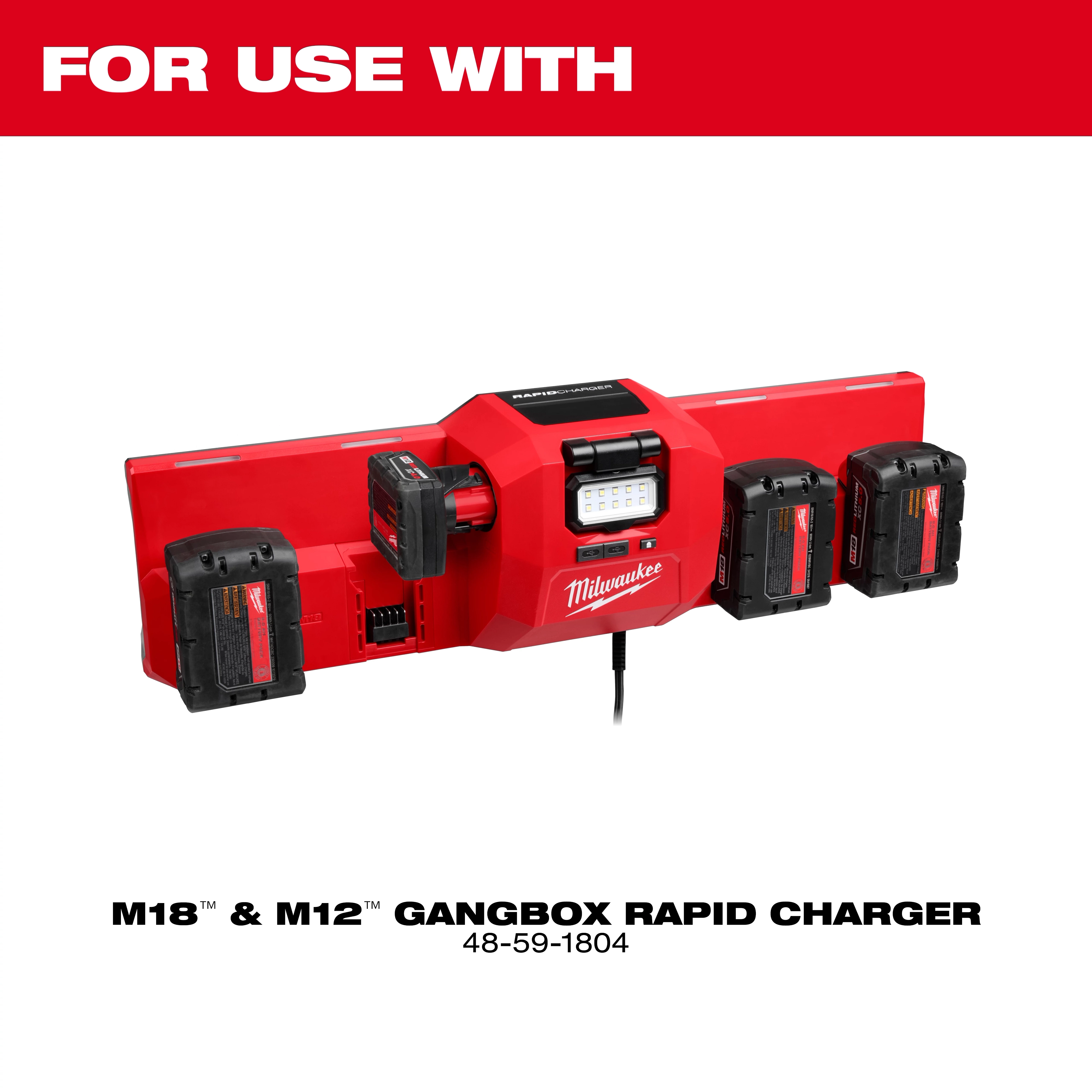 The Milwaukee M18™ and M12™ Gangbox Rapid Charger is red with slots for charging four batteries simultaneously. A digital display is present for monitoring charge levels. It is designed for quick charging and is suitable for use with Milwaukee power tool batteries.