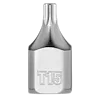 The 1/4" Drive T15 Low-Profile TORX Bit Socket features a silver metallic finish, compact design, and a T15 marking on the side. It is used for driving T15 TORX screws and bolts in tight spaces.