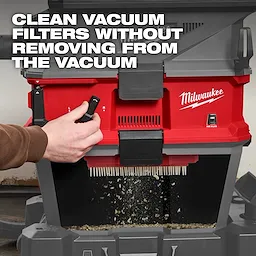 The NEXUS™ Dedicated Filter Cleaner by Milwaukee is shown in action. A hand uses the filter cleaner mechanism, while debris falls from the vacuum filter. The text overlay reads: "CLEAN VACUUM FILTERS WITHOUT REMOVING FROM THE VACUUM."