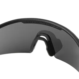 Wrap Around Safety Glasses - Tinted Anti-Scratch Lenses feature a durable, tinted lens with anti-scratch coating. These glasses offer full eye protection and have a comfortable, wrap-around design with a prominent brand logo on the top frame. Ideal for shielding eyes in construction, industrial, and outdoor environments.