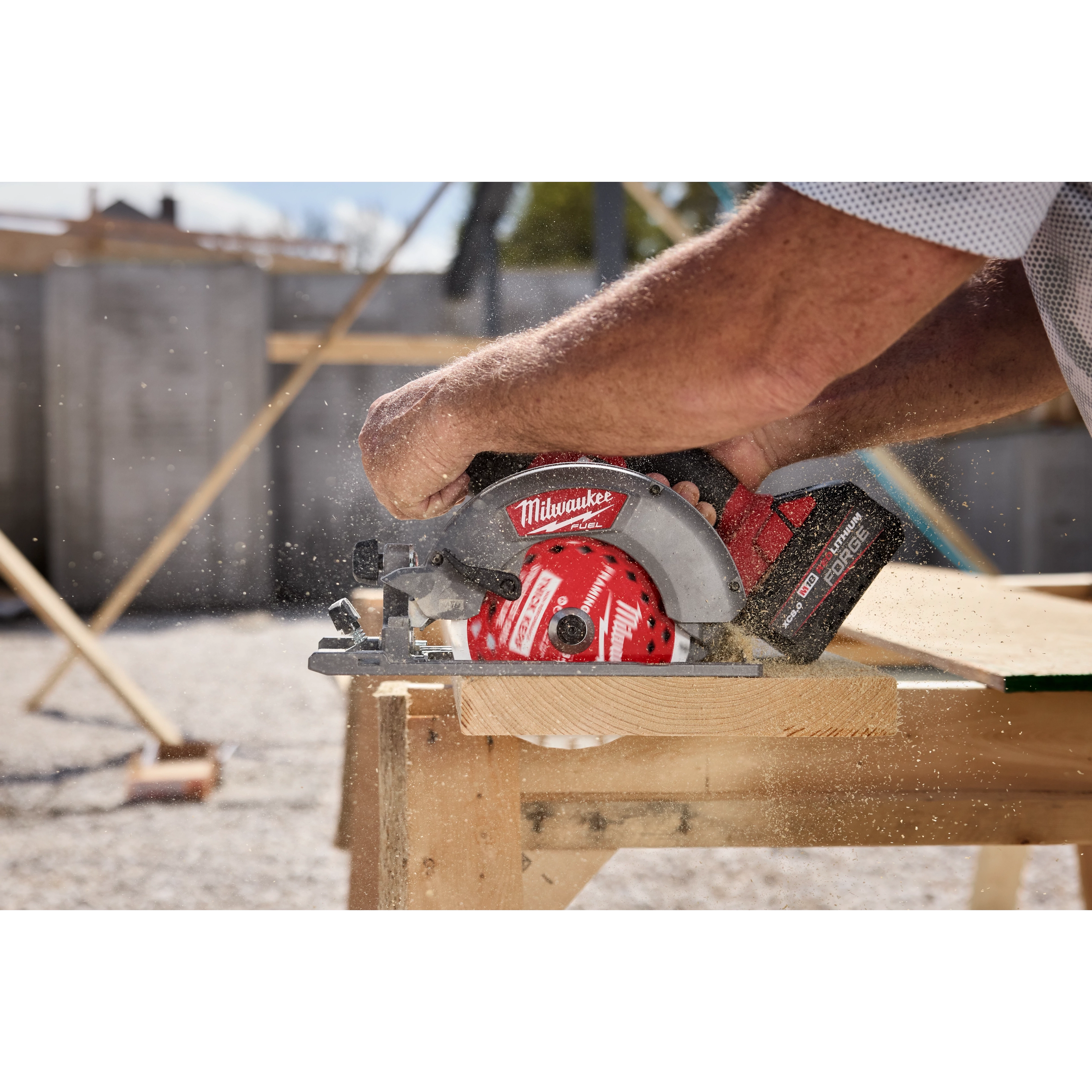 6-1/2” 24T Thick Kerf Framing Circular Saw Blade cutting a wooden board on a sawhorse outdoors
