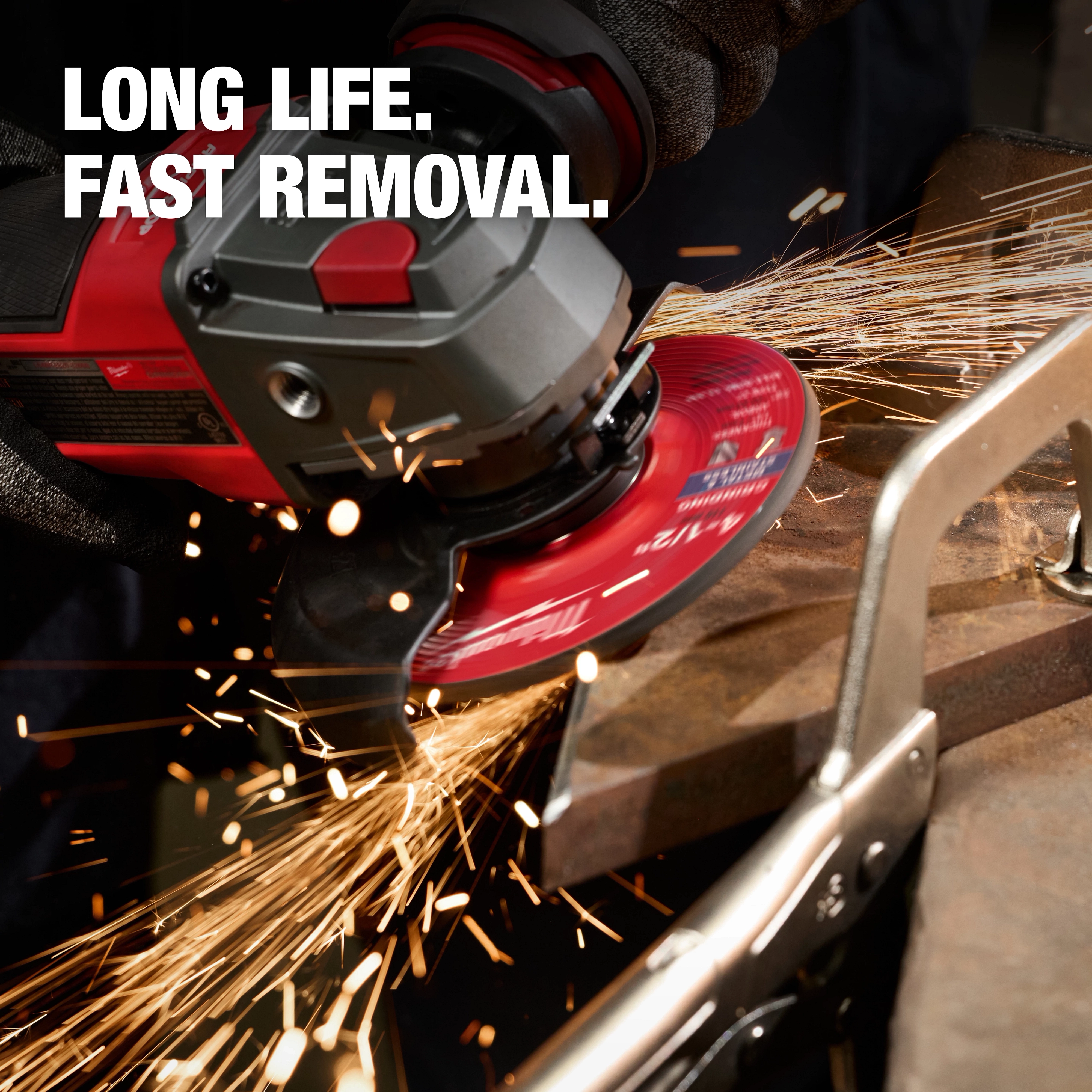 Bonded Abrasives Grinding disc in action, producing sparks while cutting through metal, with text "LONG LIFE. FAST REMOVAL."