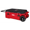 PACKOUT Rolling Tool Chest, a red and black portable storage box with large wheels, side handles, and a pull-out handle.