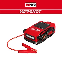 The M18™ HOTSHOT™ Jump Starter is a compact, red portable battery jump starter with attached cables and clamps. It features a Milwaukee logo, digital display, and control buttons. A red clamp and cable are connected, indicating it's ready for use in jump-starting vehicle batteries.