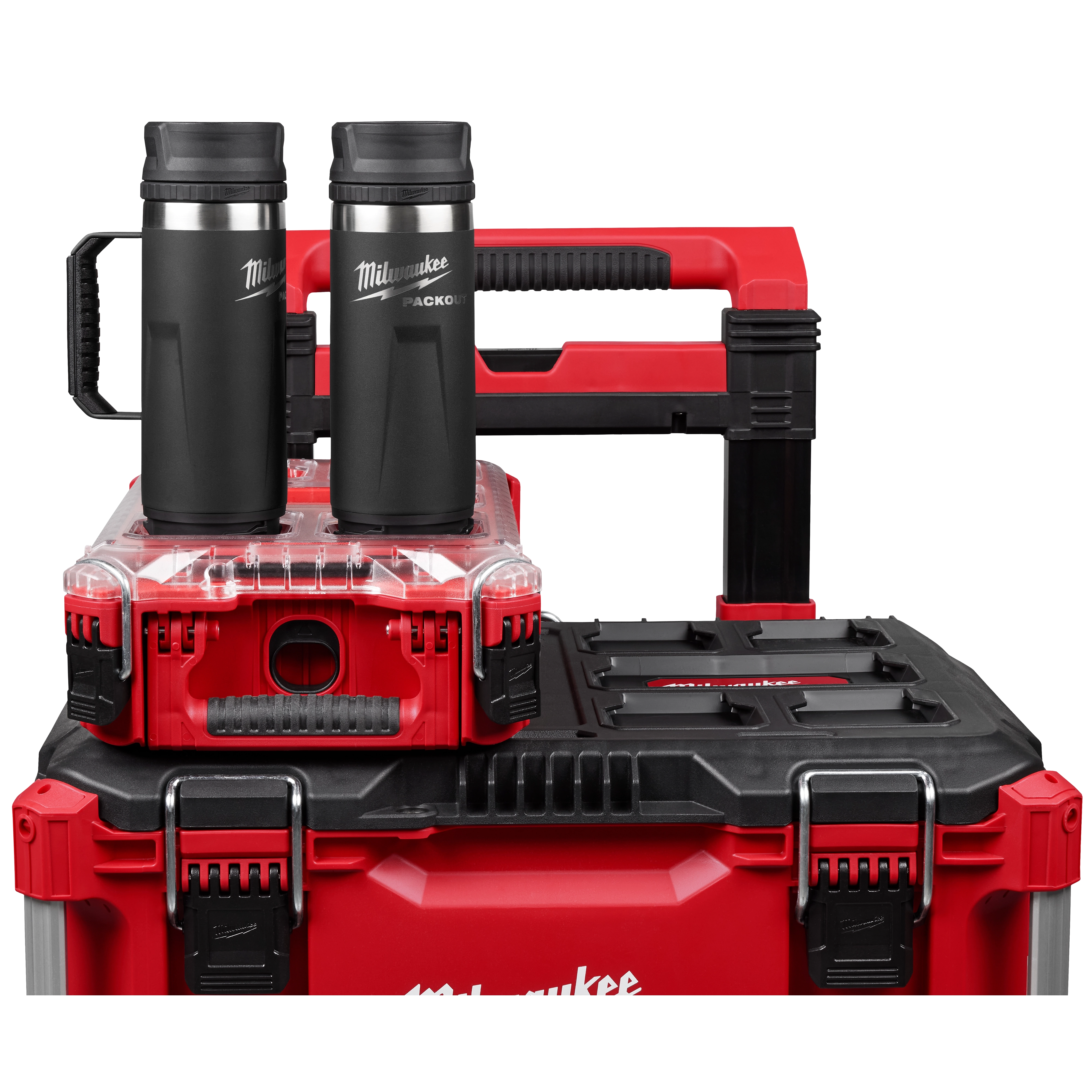 The PACKOUT™ 18oz Insulated Bottle with Sip Lid is shown placed on a robust red and black toolkit system. Two black and silver insulated bottles are visible, highlighted by their ergonomic handles and secure lids. The setup emphasizes durability and organization for professional use.