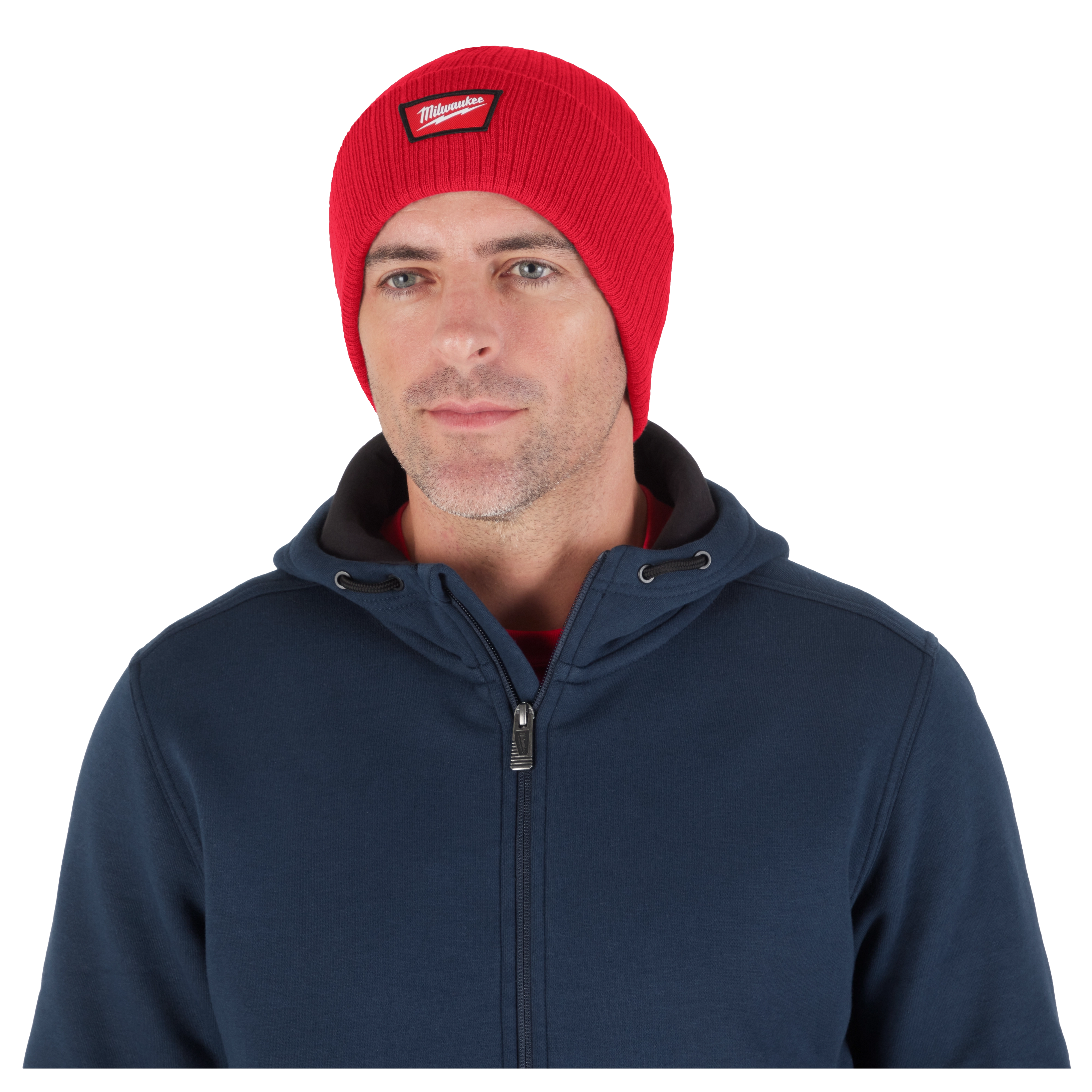 Image of a man wearing the Milwaukee Rib-Knit Cuffed Beanie in red