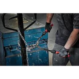 Person using 14" Adaptable Bolt Cutters with POWERMOVE Handles to cut a metal chain secured around a blue metal storage box.