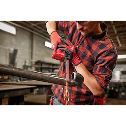 Image of the Milwaukee M12 FUEL 1/2" X 18" Bandfile being used by a worker on a pipe