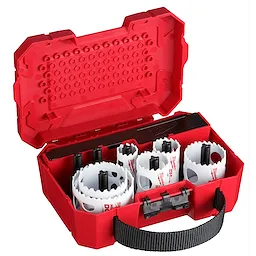 Red case containing the 10%20PC%20HOLE%20DOZER%20ELECTRICIANS%20KIT, including various sizes of white hole saws with black fittings.