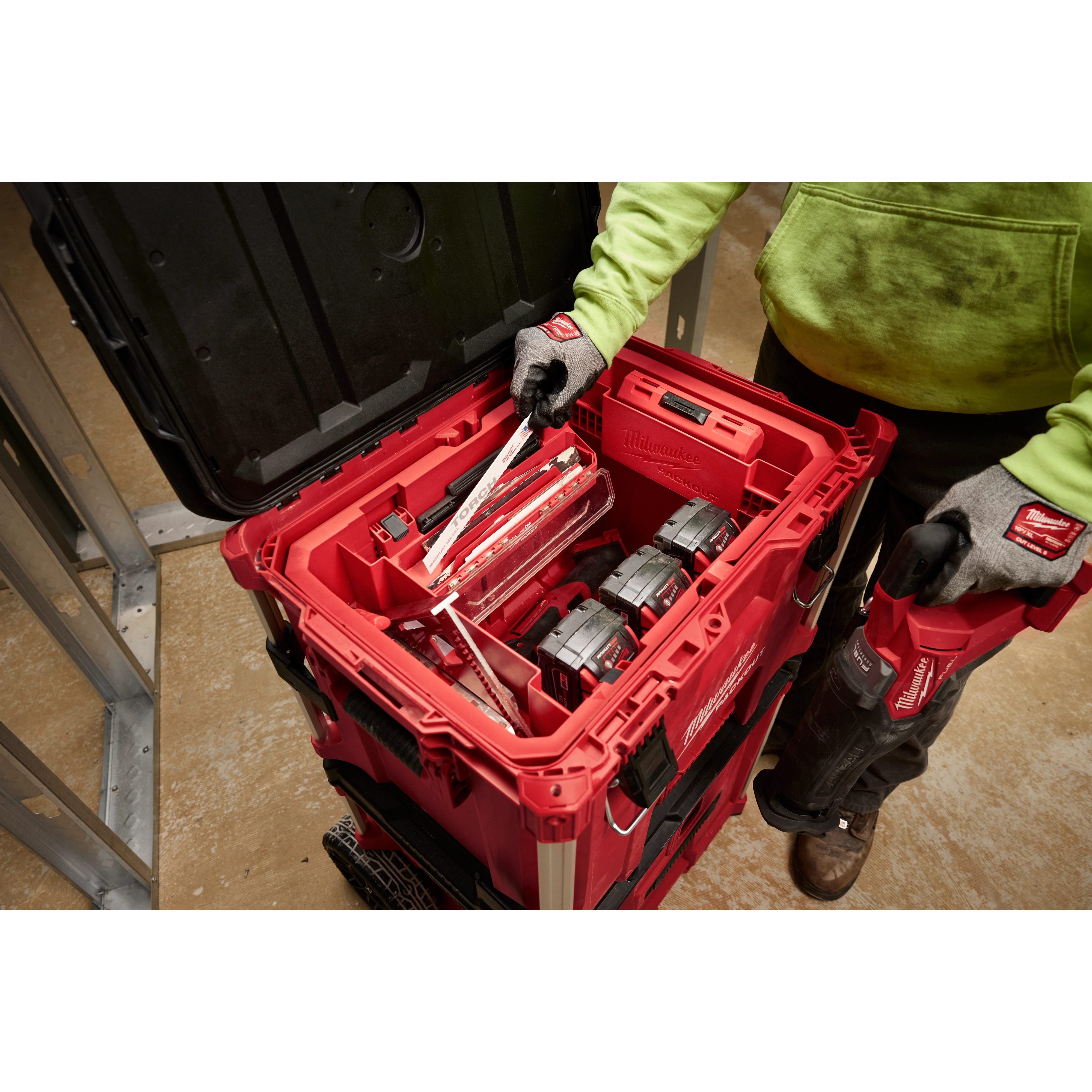 Tool Box Attachment Ready Tray for PACKOUT Tool Boxes with organized tools and accessories, held by a person in a workshop.