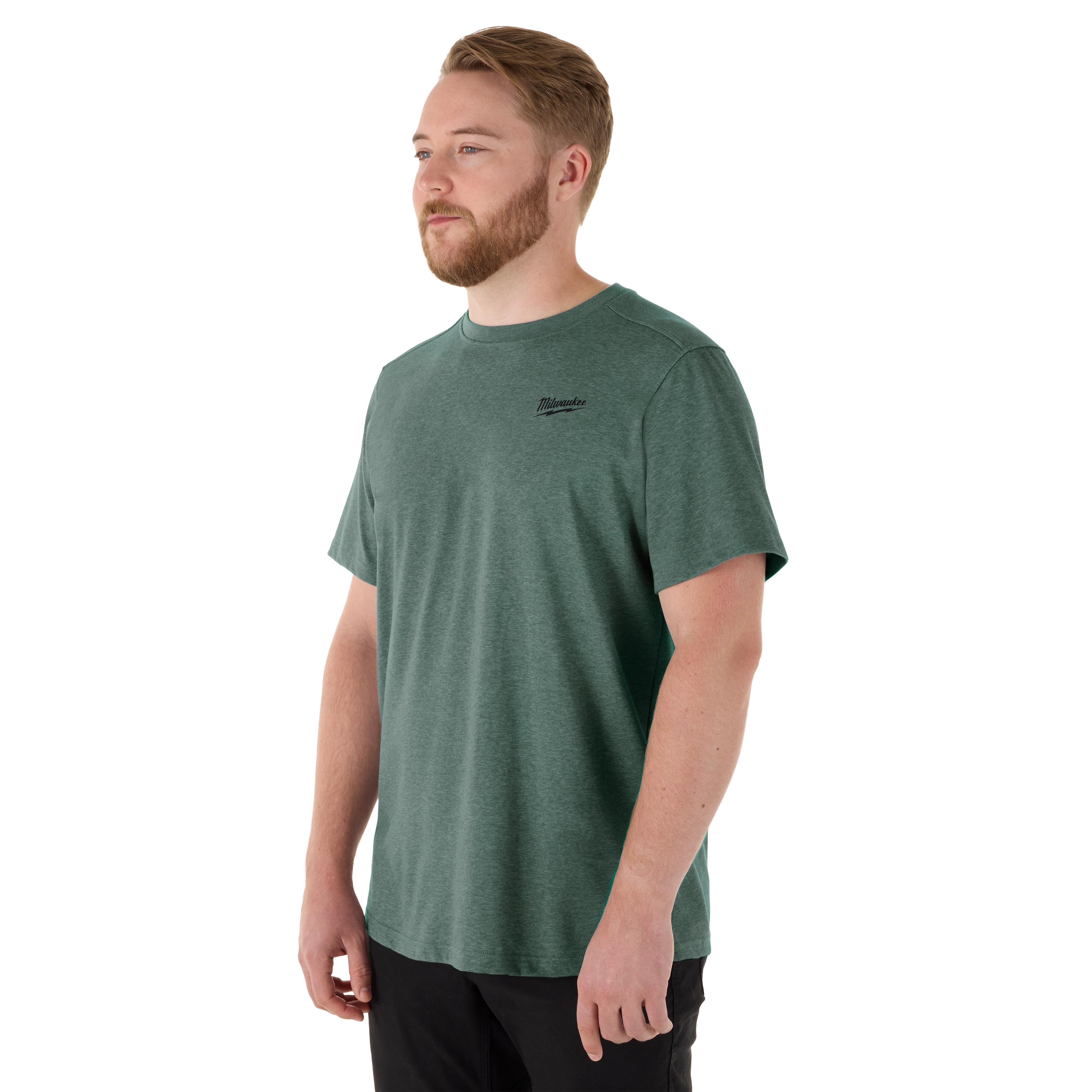 A man wearing a green FREEFLEX Hybrid Work Tee - Short Sleeve shirt. The shirt features a relaxed fit, short sleeves, and a small black logo on the left chest.