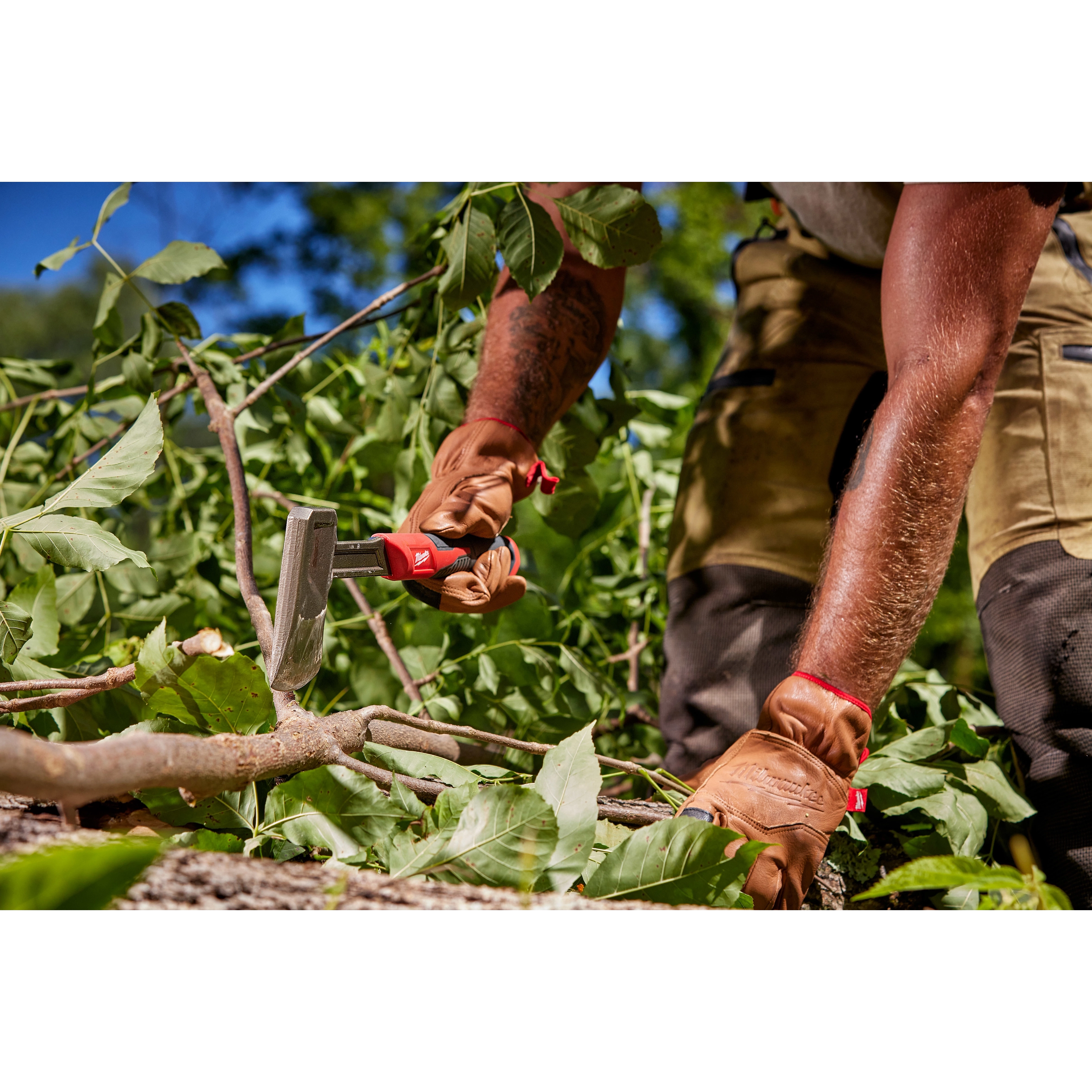 Worker using the 16” Splitting Axe