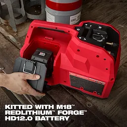 The M18 Brushless Refrigerant Recovery Machine is red, with a user inserting the M18 Redlithium Forge HD12.0 battery into the device.