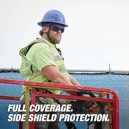 Worker wearing Polarized Full Frame Safety Glasses with Removable Side Shields and Mirrored Dual Coat Lenses operating equipment.
