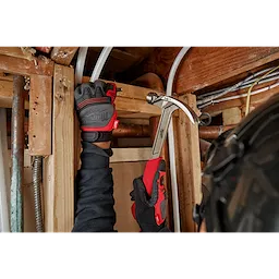 Worker using the Hammer Expansion on the jobsite to hammer in a nail