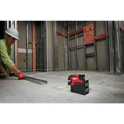 Worker using the M12 Green Cross Line and 4 Points Laser