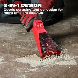 AIR-TIP Debris Scraper being used for debris scraping and collection, showcasing its 2-in-1 design for efficient cleanup. Hand wearing gloves.