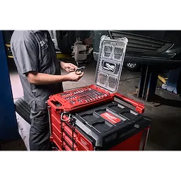 Mechanic using the 46pc 1/4” and 3/8” Drive SAE Bit Socket Set with PACKOUT Compact Low-Profile Organizer on a tool stack.