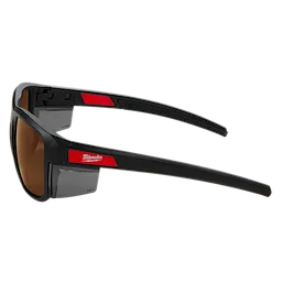 Full Frame Safety Glasses with Removable Side Shields feature brown anti-scratch lenses. The glasses are designed for enhanced protection with detachable side guards for added safety. The frame is black with red accents, displaying the brand logo on the temples.