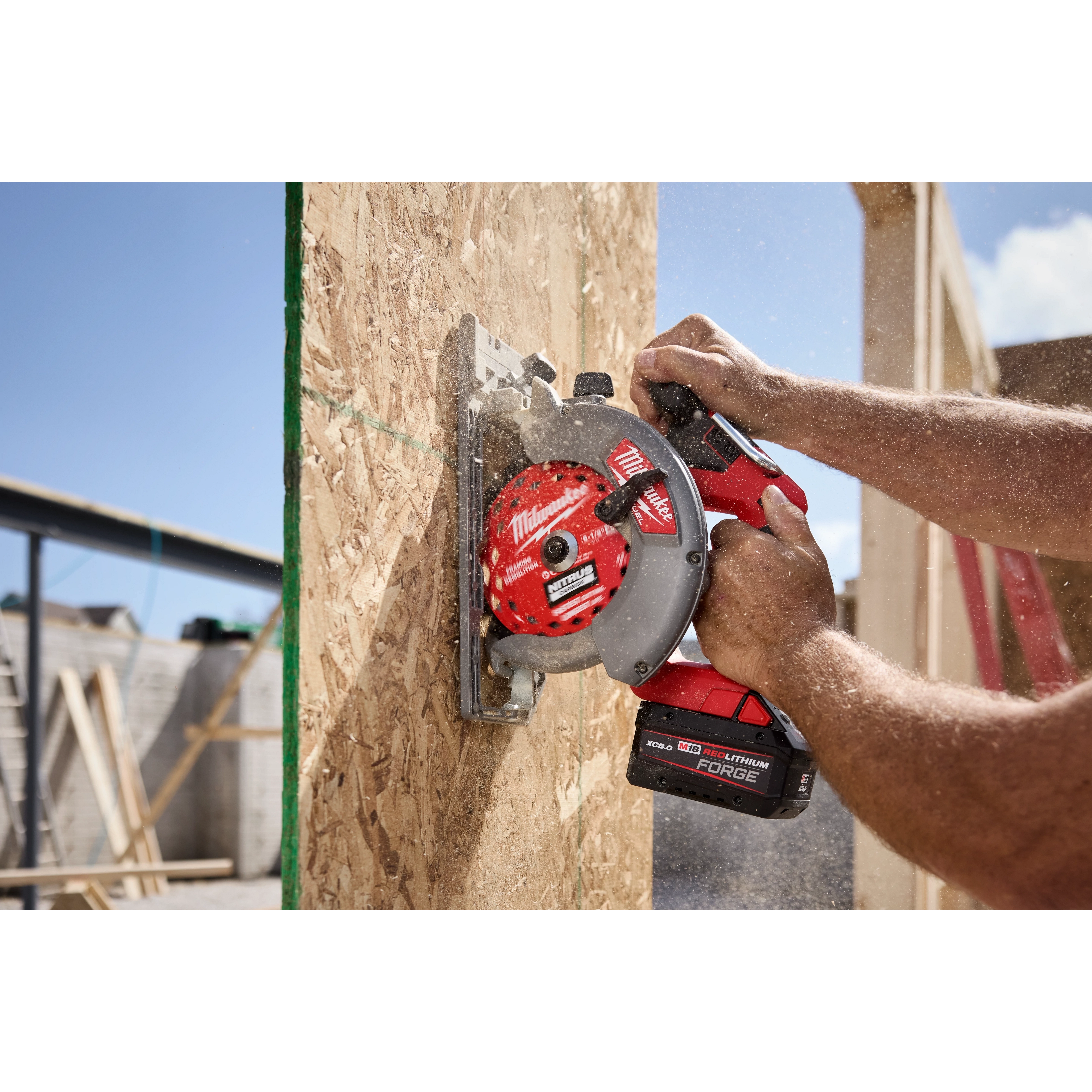 6-1/2” 24T NITRUS Carbide Framing & Demolition Circular Saw Blade cutting into an upright OSB wall panel.