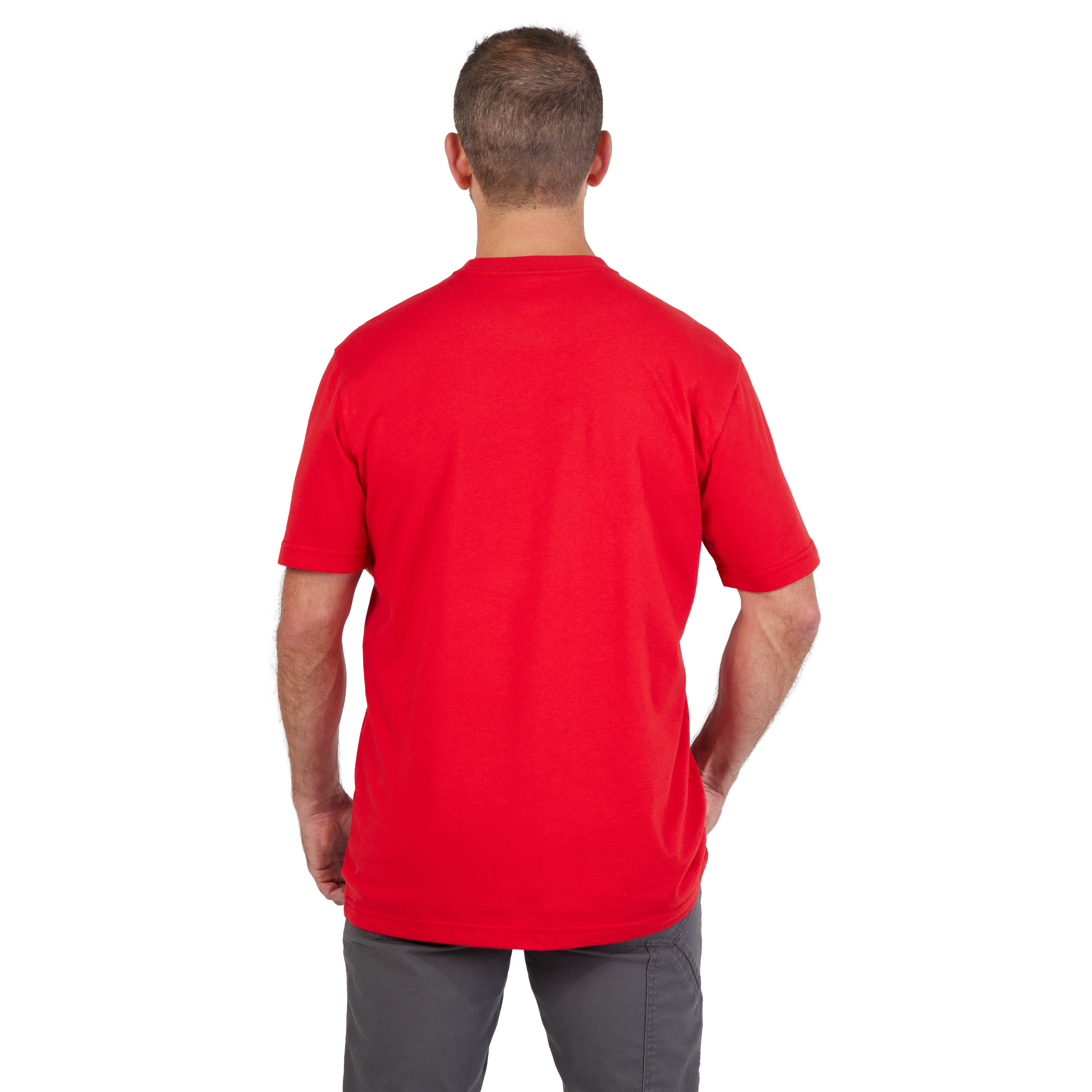 Man wearing a HEAVY DUTY T-SHIRT Short-Sleeve in red, standing with hands on hips, viewed from the back.