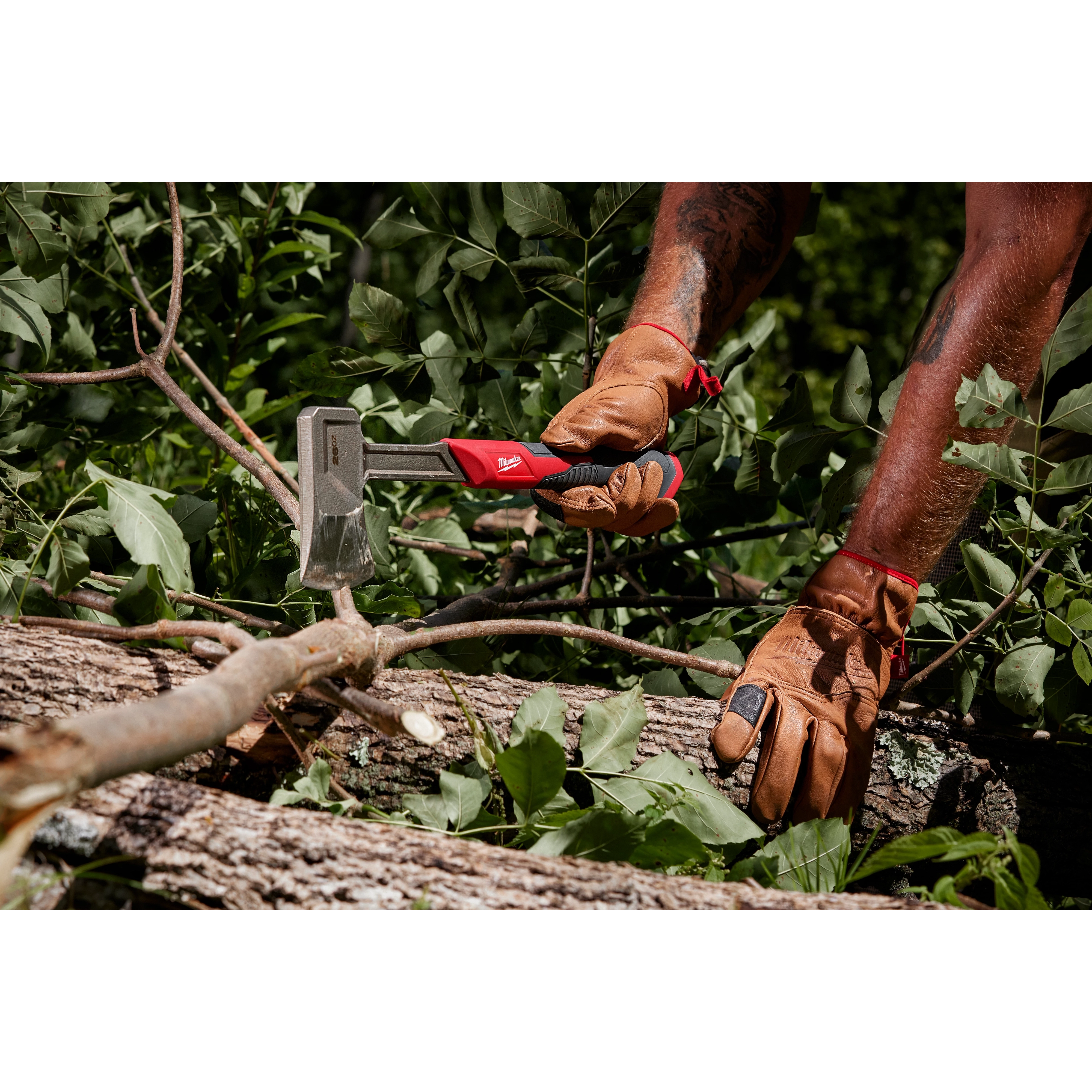 Worker using the 16” Splitting Axe