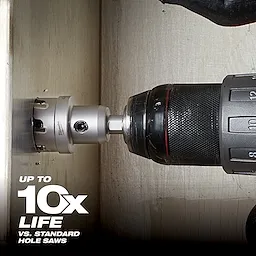 The Small Hole Cutter is attached to a power drill, cutting into a wooden surface. The text on the bottom left reads, "Up to 10x life vs. standard hole saws," highlighting the durability of the product in comparison to standard hole saws.