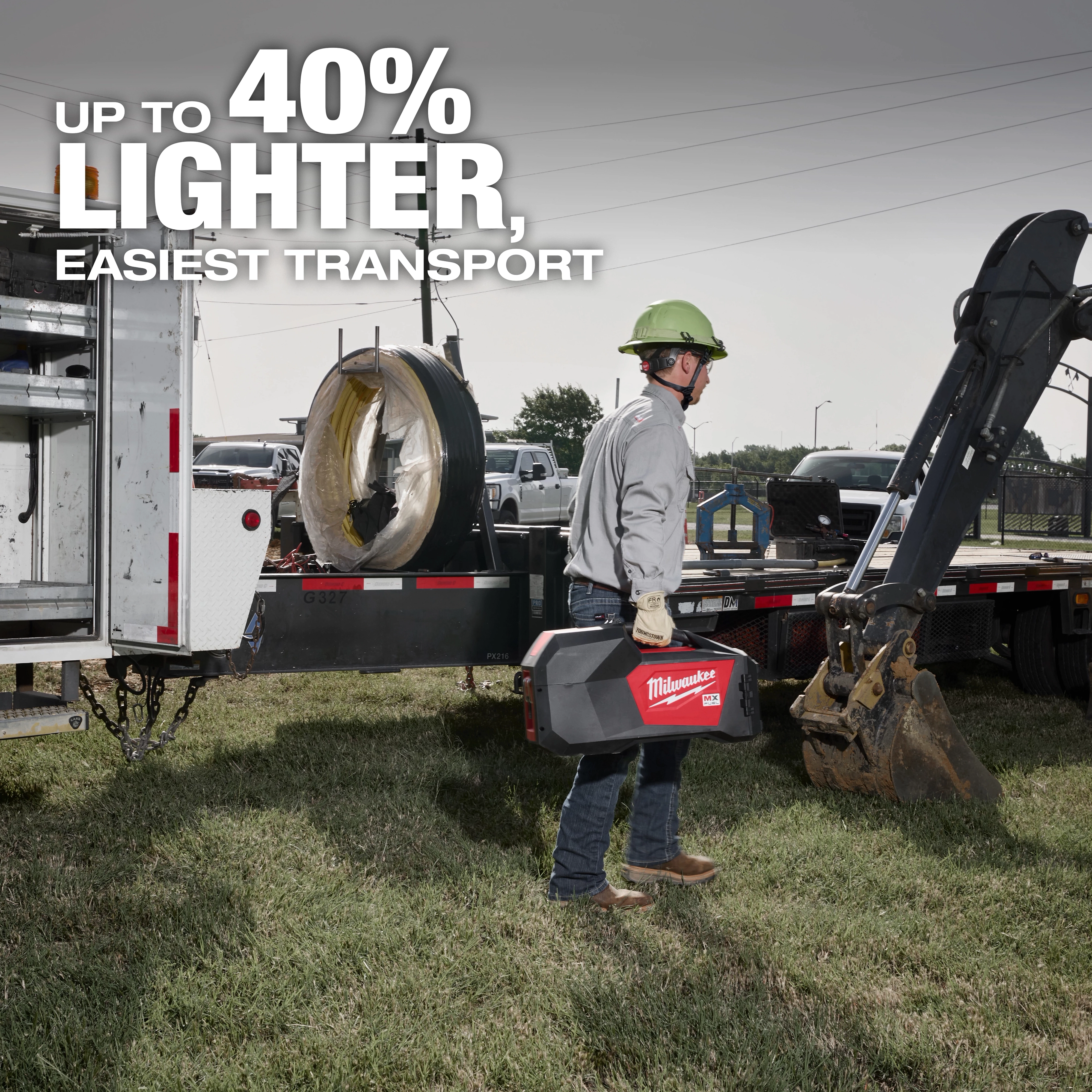 A worker in a hard hat carries the MX FUEL™ Electrofusion Processor on a job site. The text reads, "Up to 40% lighter, easiest transport," highlighting the product's portability. The worker stands near construction equipment and a truck with tools.