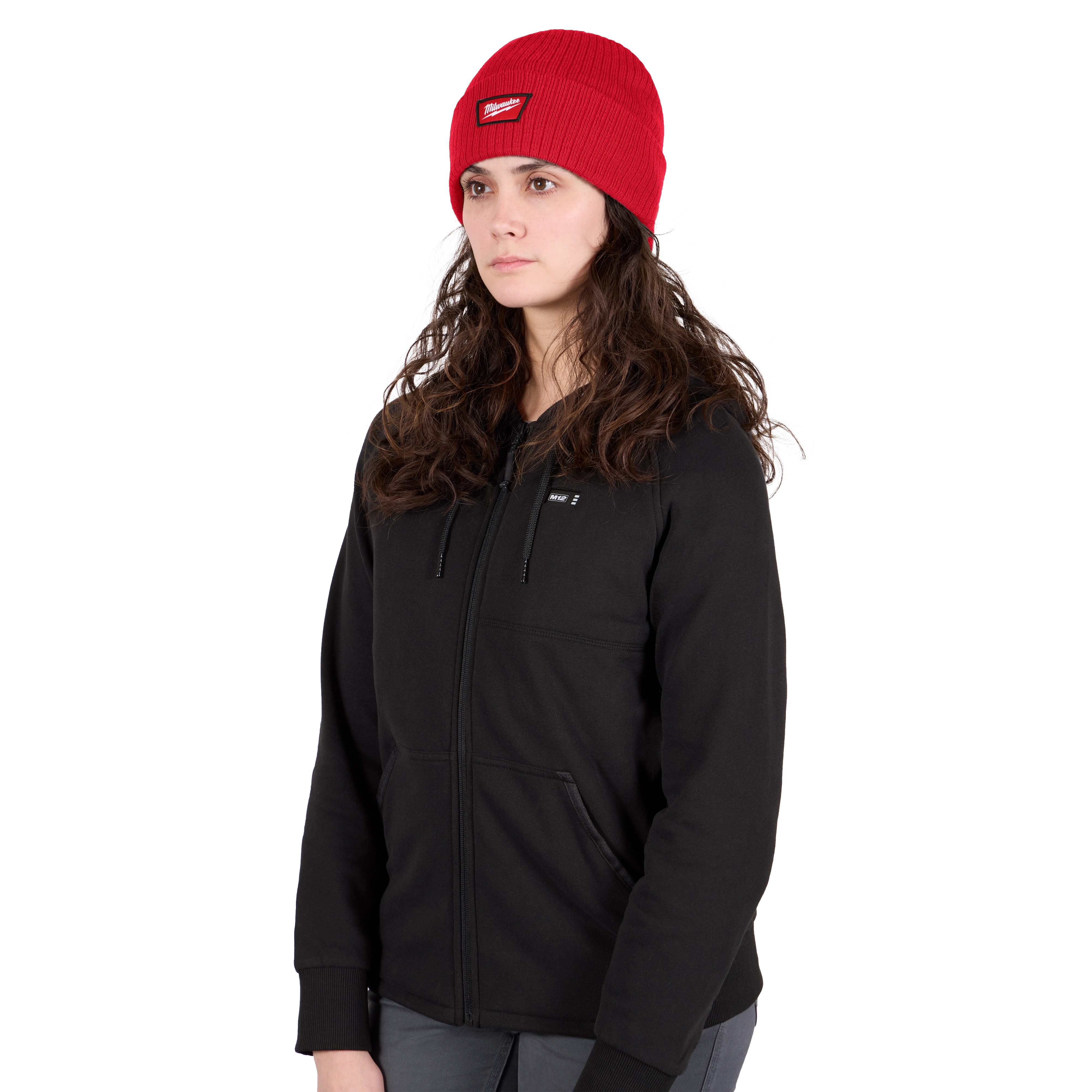 Image of a woman wearing the Milwaukee Rib-Knit Cuffed Beanie in red