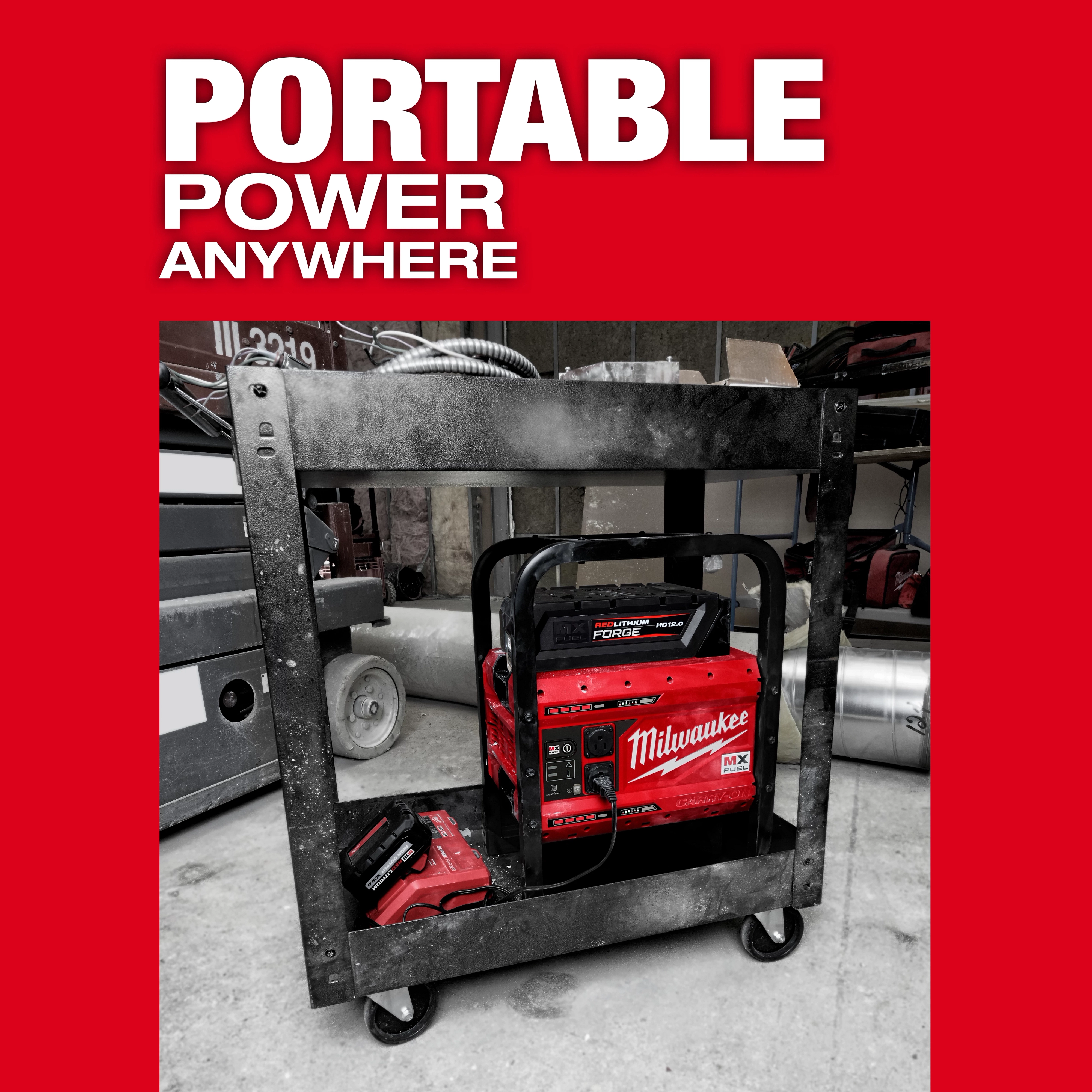 The MX FUEL CARRY-ON 3600W/1800W Power Supply and Charger with MX FUEL REDLITHIUM FORGE HD12.0 is displayed within a rugged metal frame. The image emphasizes portable power, suitable for various environments. The bright red equipment contrasts with its industrial surroundings, promoting reliability and efficiency.