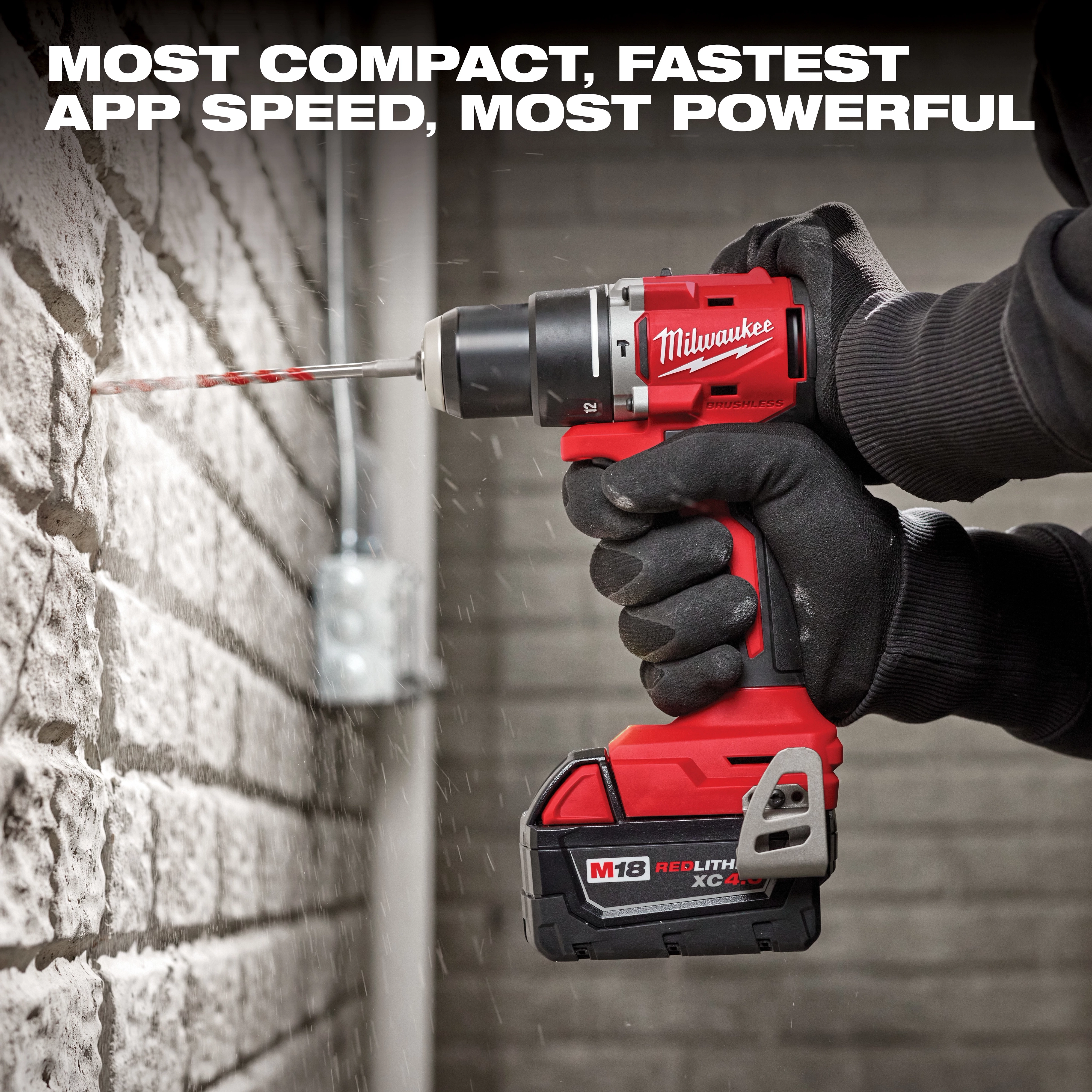 A person uses a power drill from the M18 4-Tool Combo Kit to drill into a brick wall. The drill has a red and black design with a visible battery pack labeled "REDLITHIUM XC4.0." The text above highlights the drill’s compact, fast, and powerful performance.