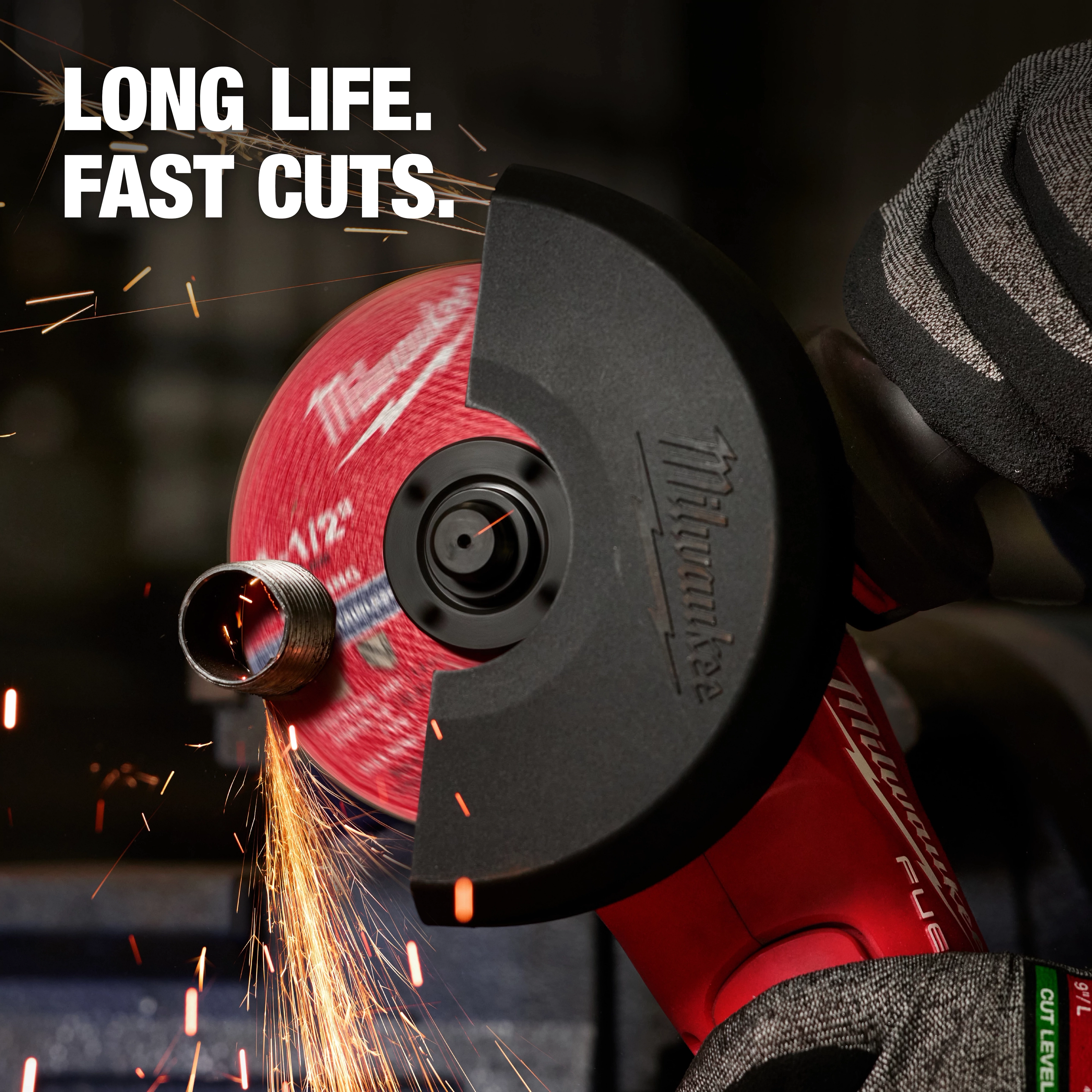 A Bonded Abrasives Cutting disc in use, emitting sparks as it cuts through a metal pipe. Text reads "Long life. Fast cuts."