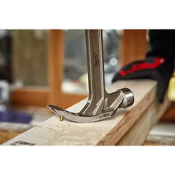 The Hammer Expansion extracting nails from a wood board