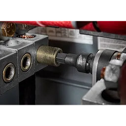 1/2" Drive 1/2" Hex Bit Socket attached to a metallic apparatus, shown in use tightening or loosening a bolt or fastener.