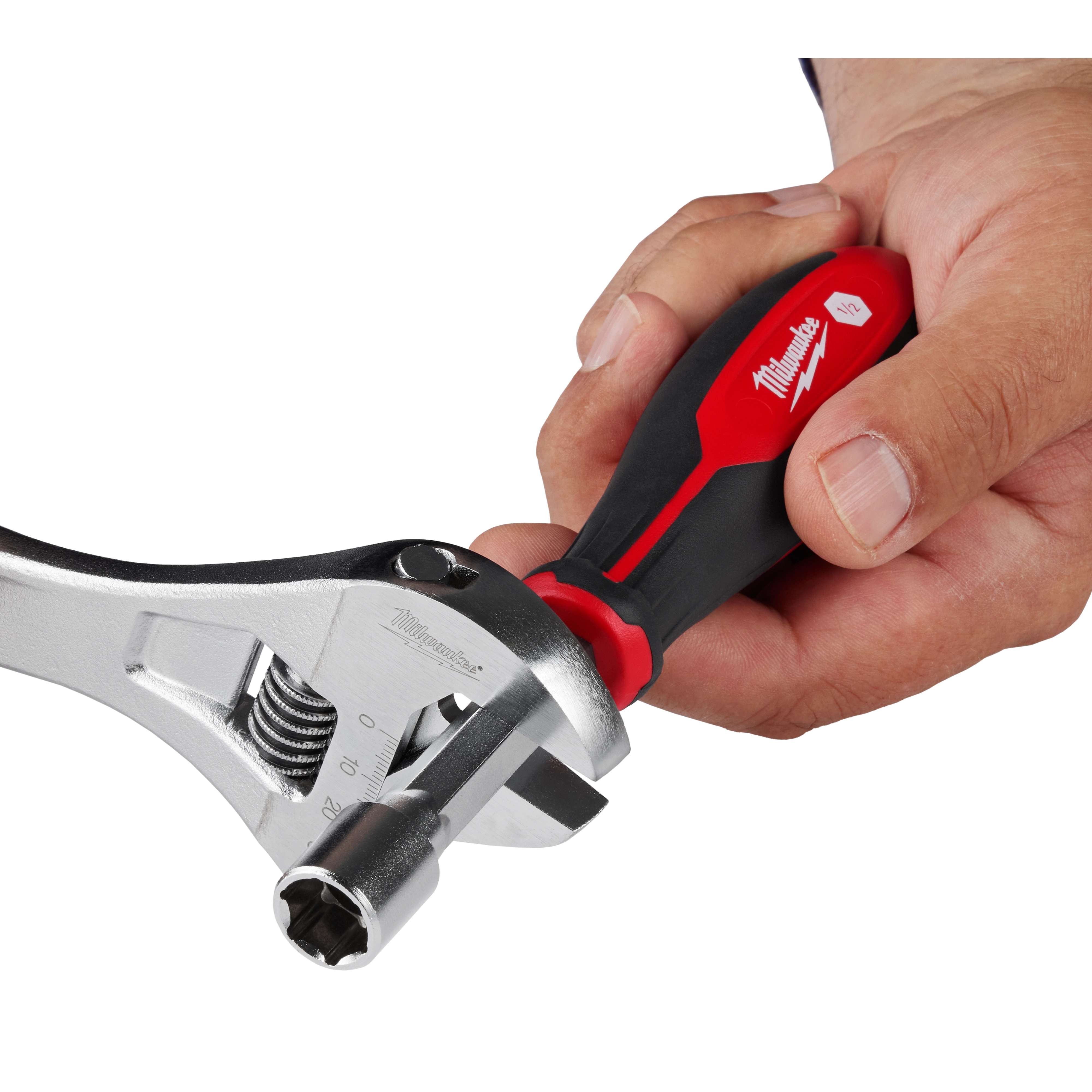A hand holds the 1/2" HollowCore Magnetic Nut Driver using an adjustable wrench, highlighting the tool's magnetic feature.