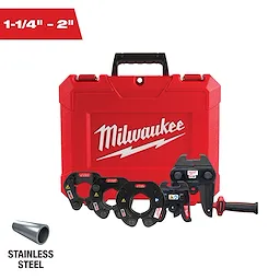 This image shows a red Milwaukee tool case with a handle, labeled "Milwaukee." In front of the case are various size clamp tools, ranging from 1-1/4 inches to 2 inches. A stainless steel pipe and the text "STAINLESS STEEL" are visible in the lower left corner.