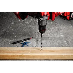 7pc. SHOCKWAVE Impact Duty Carbide Multi-Material Drill Bit Concrete Screw Install Kit being used to drill into a wooden plank.