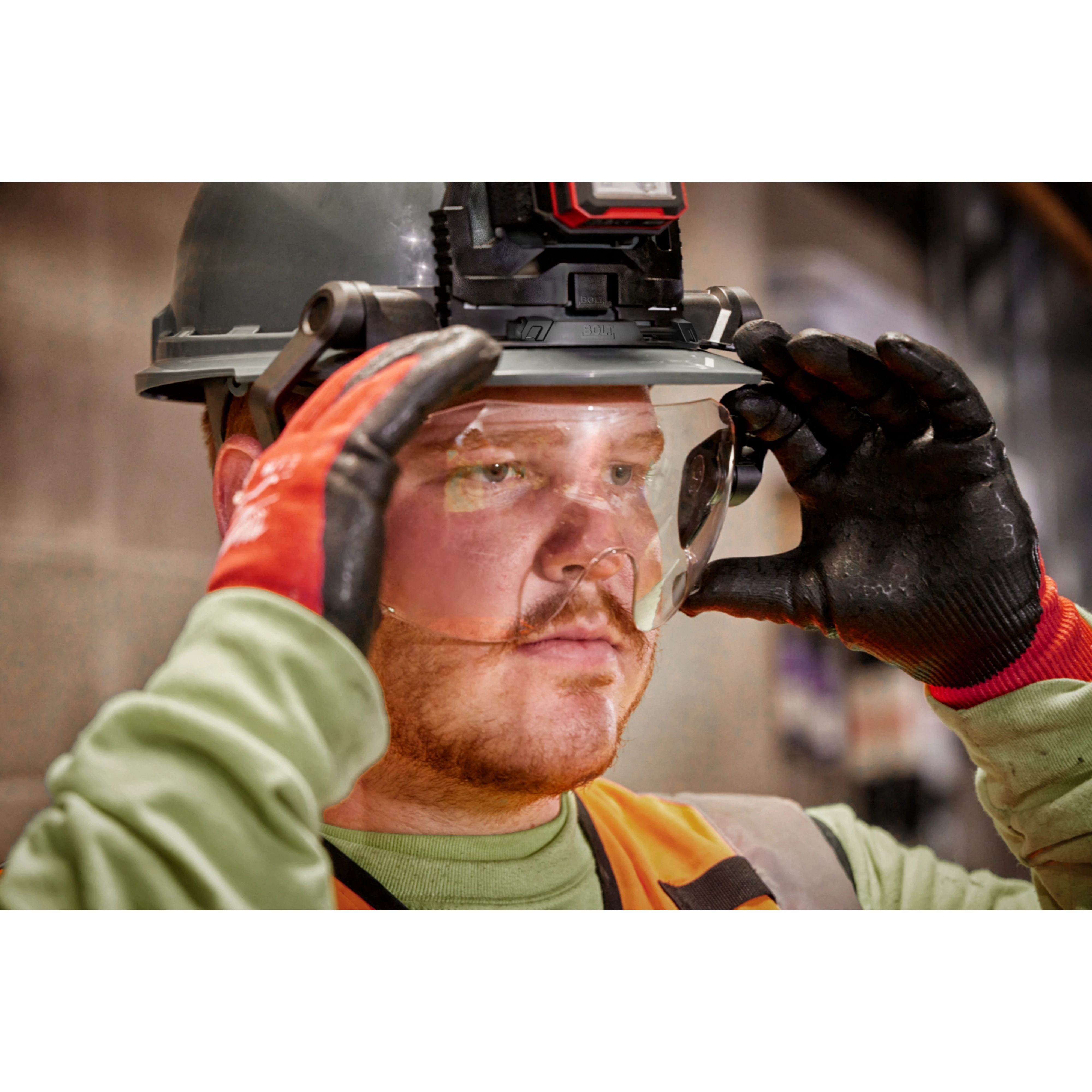 Worker wearing the BOLT Eye Visor CLear Dual Coat Lens on the job site