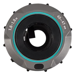 The 1.6" - 1.8" Adjustable Bushing for M18 FUEL™ Covered Conductor Cable Stripper is a silver and black circular tool with teal accents and size markings. It is designed for stripping conductor cables efficiently.