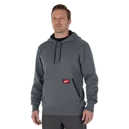 Man wearing the gray midweight pullover hoodie