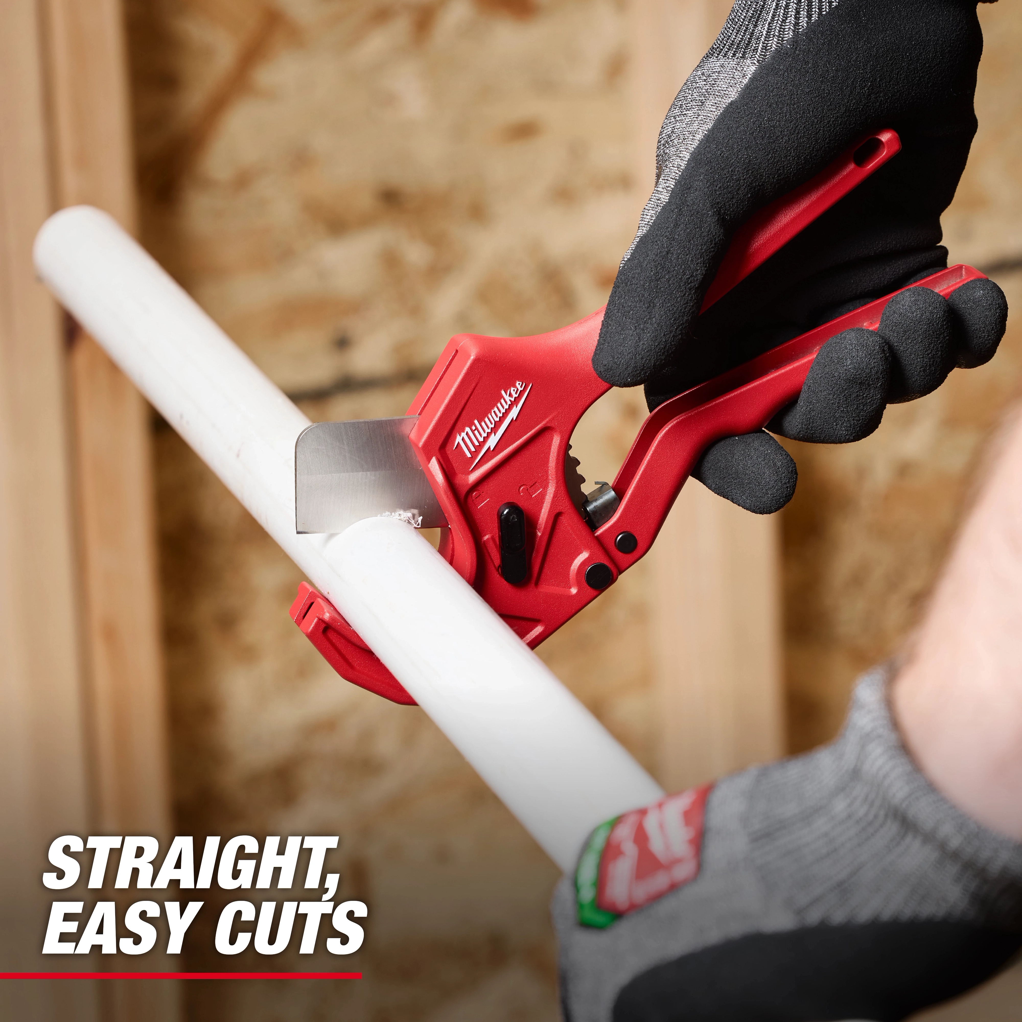 1-5/8" Ratcheting Pipe Cutter in use, featuring a red handle and ratcheting mechanism cutting through a white pipe. Text reads "Straight, Easy Cuts".