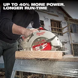 A person is using the Milwaukee circular saw to cut a piece of wood on a construction site. The text above reads "Up to 40% more power, longer run-time."