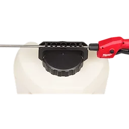 A close-up view of a 4-Gallon Sprayer Tank Assembly w/ SWITCH-TANK™. The image shows the top part of a white tank with a large black cap and a red handle attachment on the side. The handle has the Milwaukee logo on it.