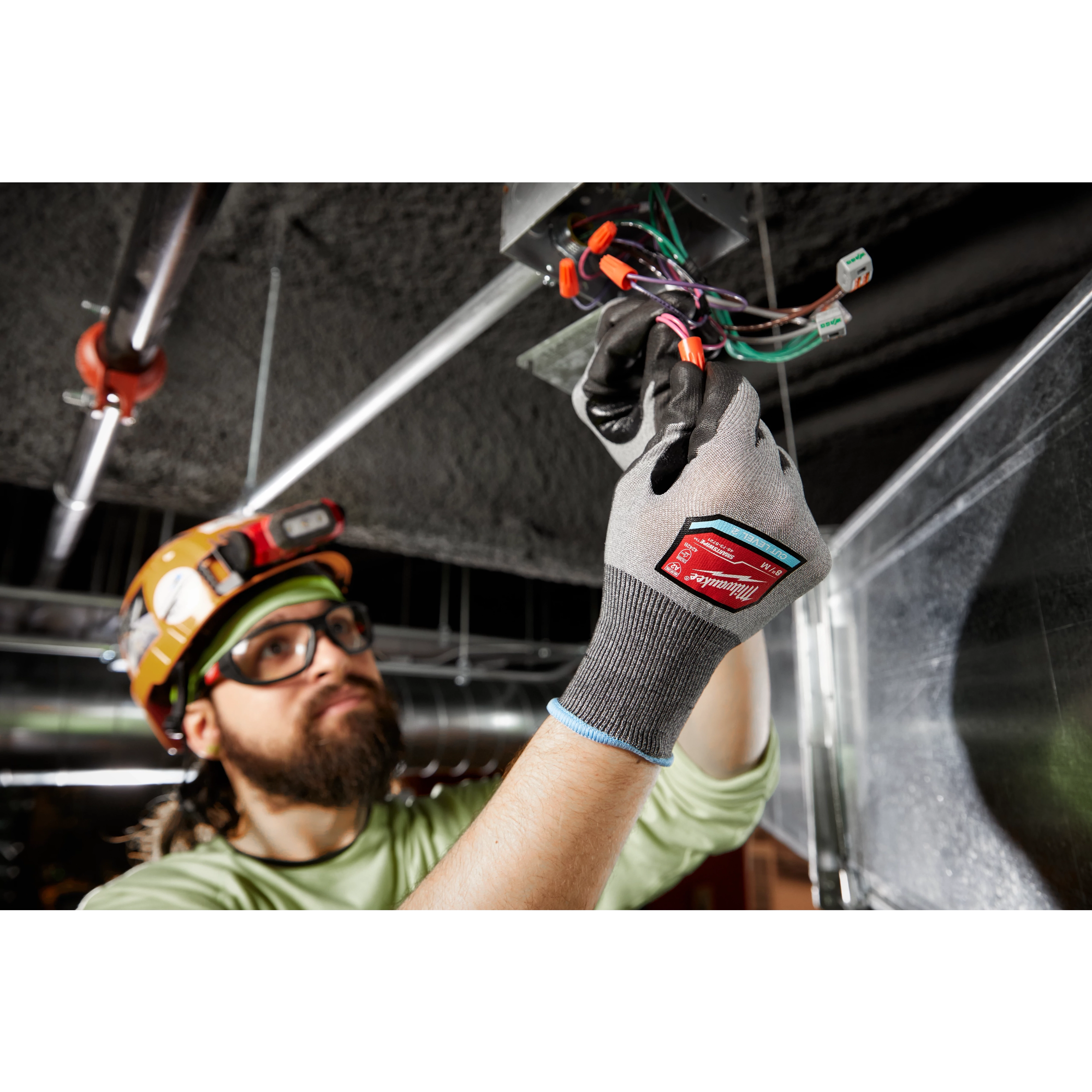 Worker wearing the Cut 2 High-Dexterity Gloves on the jobsite